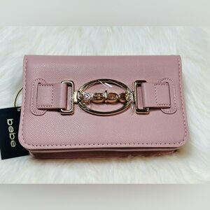 Bebe Pink Crossbody Bag in a powder pink with Gold Accents